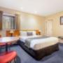 Guest room with three beds