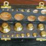 brass weights in box