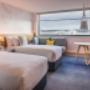 Social View Room is stylish and chic, with wall-to-wall windows offering sweeping views of Auckland harbour.