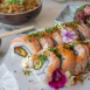 Seared salmon Philadelphia roll: Ora king salmon, avocado, cucumber, tobiko, salmon caviar and chives