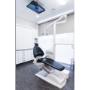 Modern treatment room at ER Dental Pyes Pa with a dental chair, examination light and digital equipment for general, cosmetic and emergency dentistry.