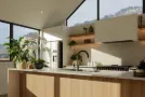 Kitchen with timber-look island and mountain views - Inspire Kitchens