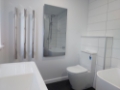 Modern Shower over Bath installed by Glam Bathrooms Ltd