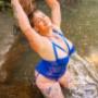 woman in river enjoying her me time