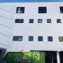 4 Stories Building PUKEKOHE Solid plaster paint white 1