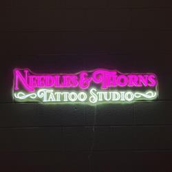 Needles & Thorns Tattoo Studio