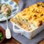 Fisherman's Pie- A comforting creamy dish made with a selection of fish and vegetables, all topped off with cheesy baked potato slices