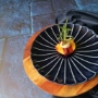 Peach wrapped in housemade vegan bacon as appetizer