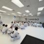 A full mat at Sorriso Brazilian Jiu-Jitsu Club in Botany. Members from white belt to black belt train side by side in one of the area's largest matted spaces.